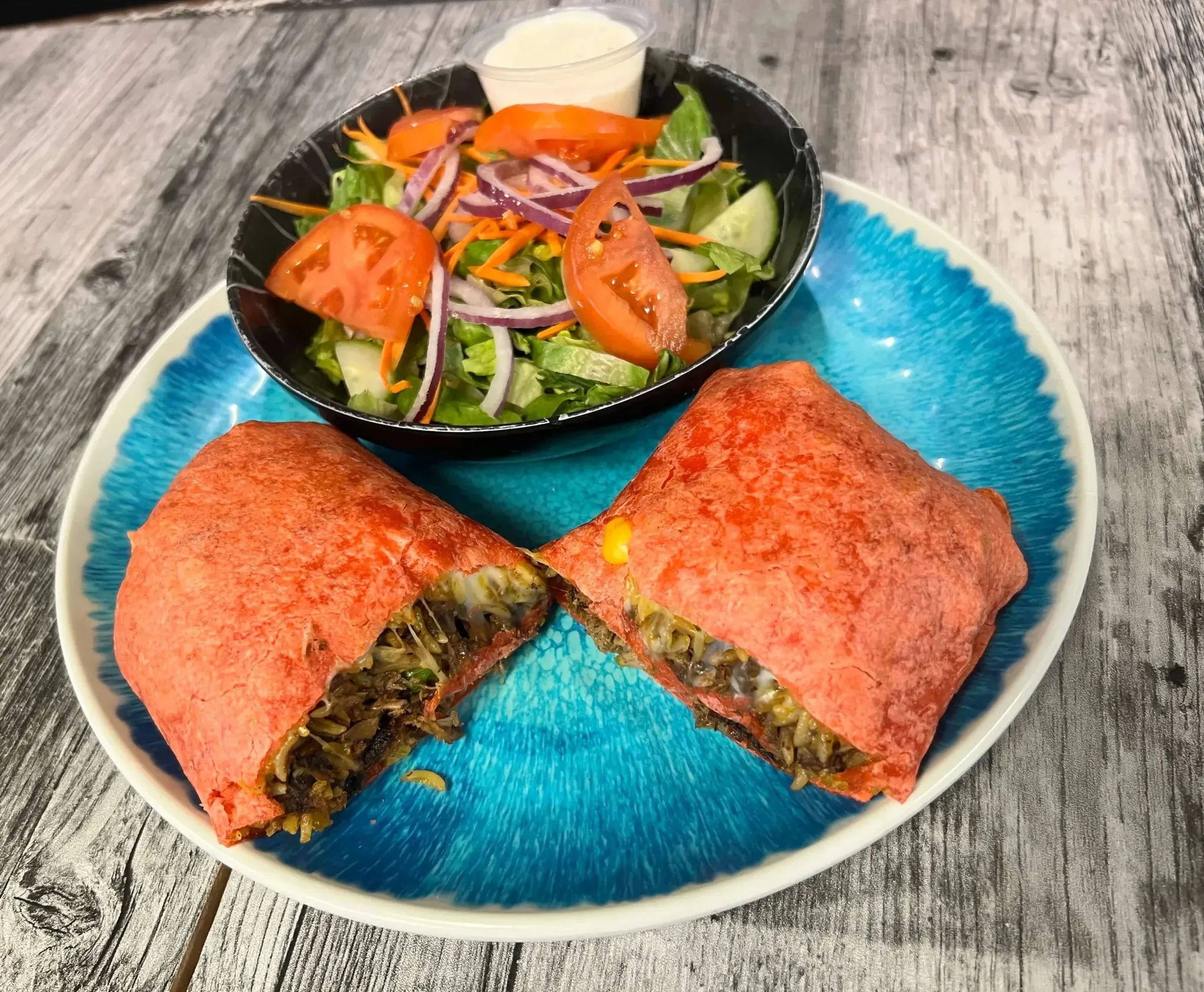 Fresh samosas with signature chutney at The Farmer's Cuisine Indian restaurant Winnipeg